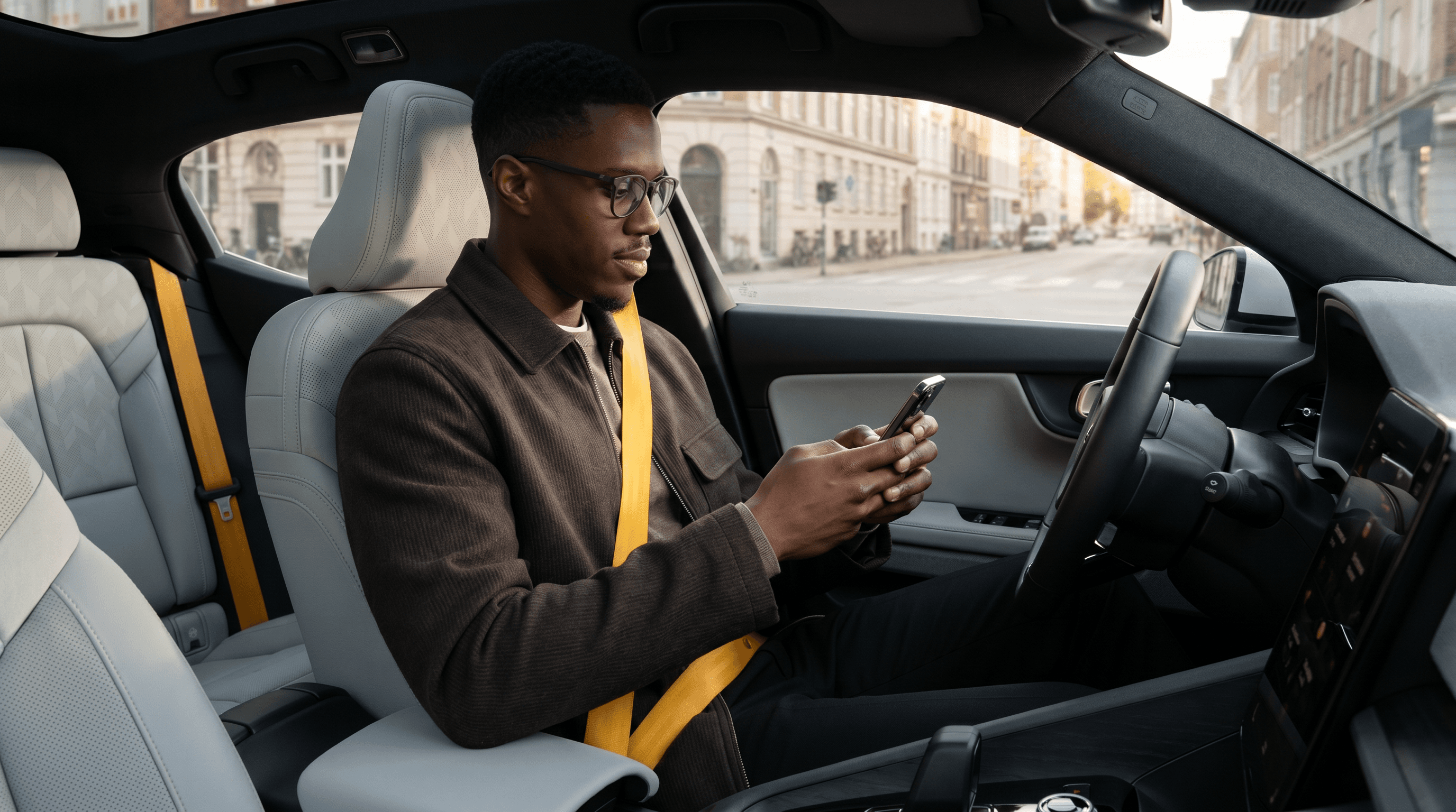 A Drift driver checking the app in their car